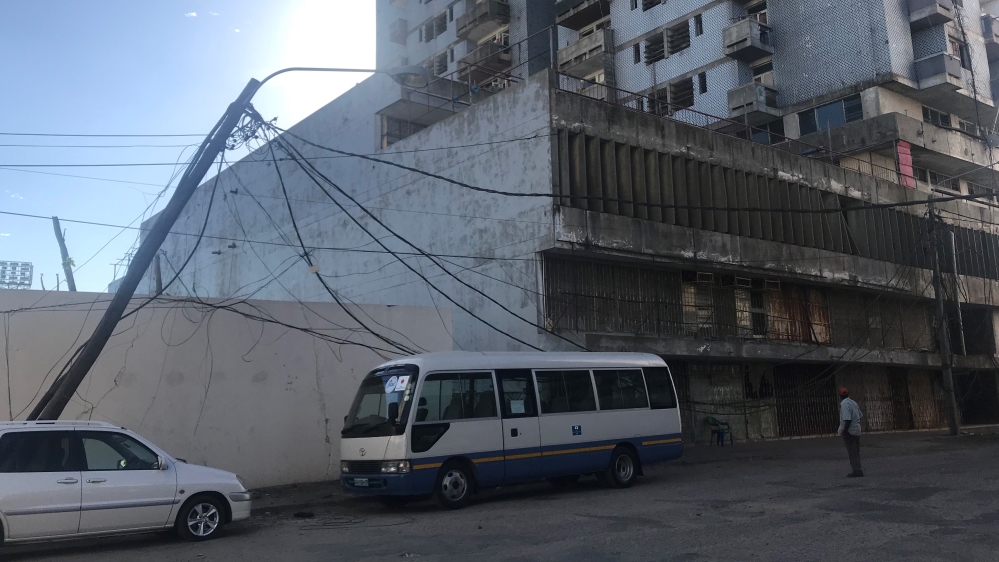 Power cables pulled down by the storm in Beira [Fidelis Mbah/Al Jazeera]