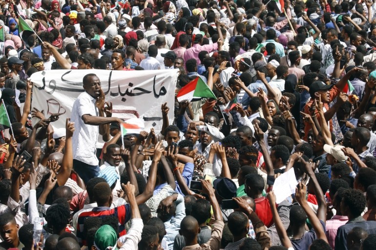 Sudanese demonstrators gather in a street in central Khartoum on April 11, 2019, immediatly after one of Africa''s longest-serving presidents was toppled by the army. Organisers of protests for the ou