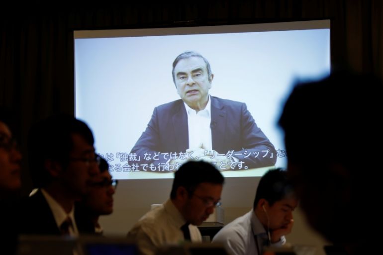 A video statement made by the former Nissan Motor chairman Carlos Ghosn is shown on a screen during a news conference by his lawyers at Foreign Correspondents'' Club of Japan in Tokyo
