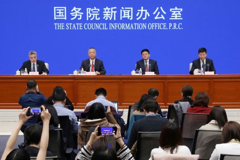 Officials of Ministry of Public Security, National Health Commission and National Medical Products Administration attend a news conference on fentanyl-related substances control, in Beijing