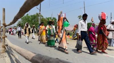 Devotees on their way to various sacred sites in Ayodhya [Amar Deep Sharma/Al Jazeera]