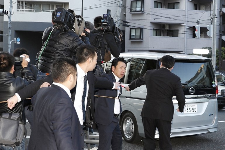 A van believed to be carrying former Nissan Motor Chairman Carlos Ghosn leaves Ghosn''s residence in Tokyo
