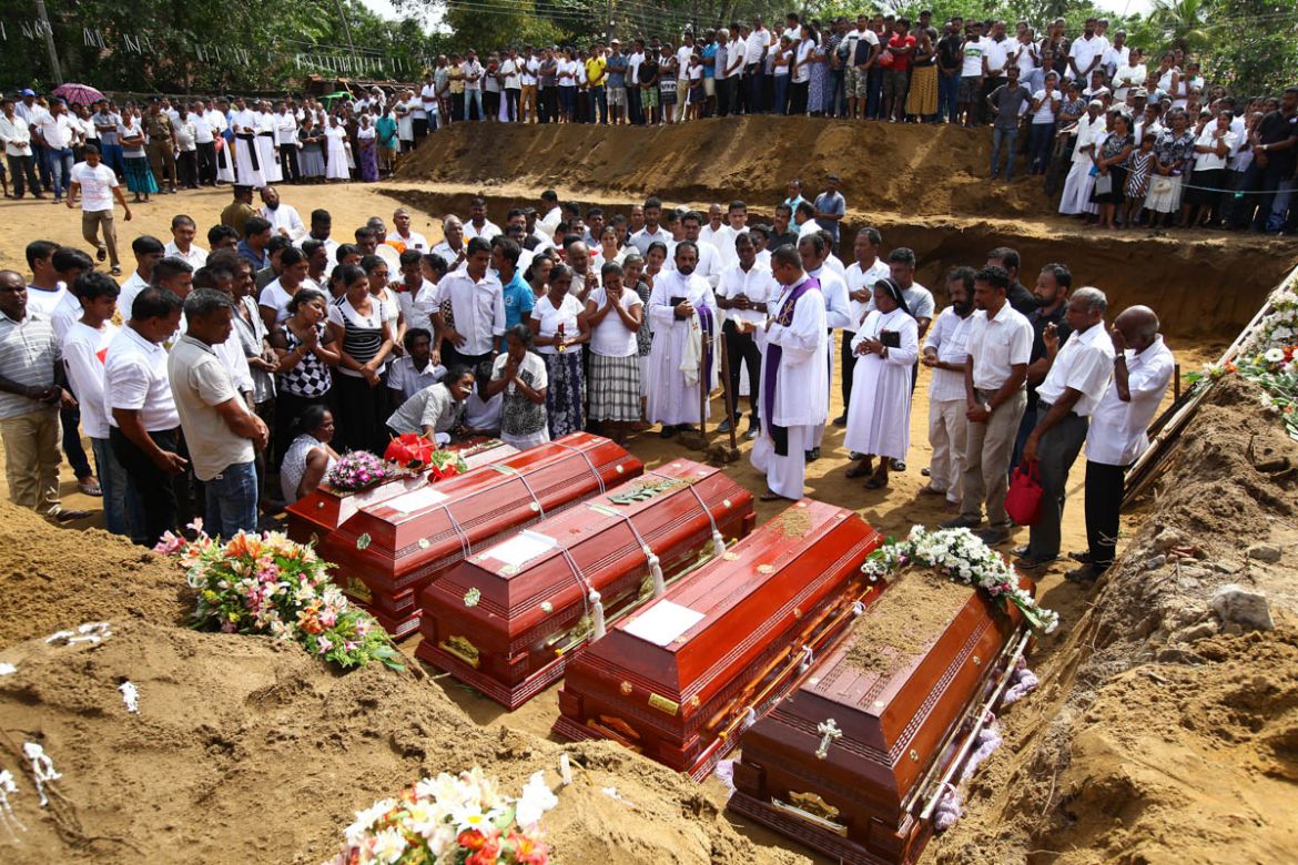 Funeral Ceremony for the Victims of multiple explosions in Sri Lanka- - NEGOMBO - SRI LANKA - APRIL 23 : People attend burial ritual of the victims of multiple terror attacks during a funeral ceremony