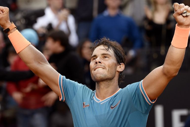 Rafael Nadal of Spain celebrates after winning against Novak Djokovic of Serbia during their ATP Masters tournament final tennis match at the Foro Italico in Rome on May 19, 2019. Filippo MONTEFORTE