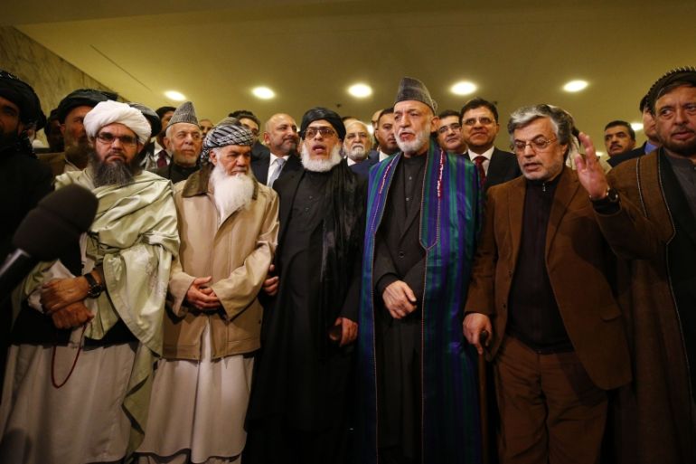 Taliban meet Afghan politicians in Moscow for peace- - MOSCOW, RUSSIA - FEBRUARY 06: Head of Political Office of the Taliban Sher Mohammad Abbas Stanakzai (3rd L), former President of Afghanistan Hami