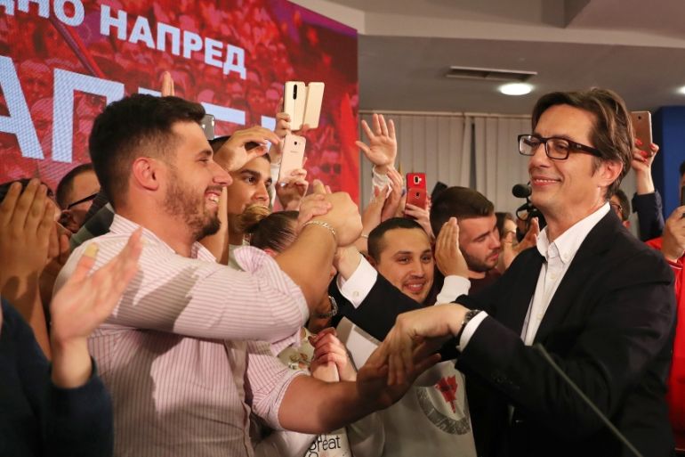 Presidential candidate of the ruling SDSM Stevo Pendarovski greets supporters as he celebrates after preliminary results during the presidential election in Skopje, North Macedonia May 5, 2019. REUTER