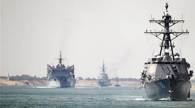The Abraham Lincoln Carrier Strike Group transits the Suez Canal on May 9 [US Navy handout via AFP]