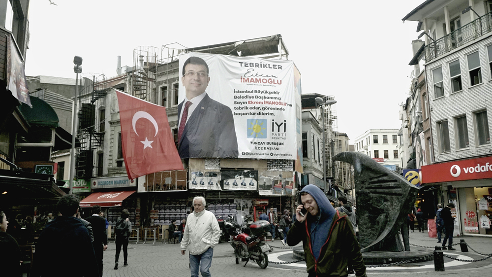 A sign in Istanbul's Besiktas neighbourhood congratulating Ekrem Imamoglu on winning the mayoral election [Jeffrey Bishku-Aykul/Al Jazeera]