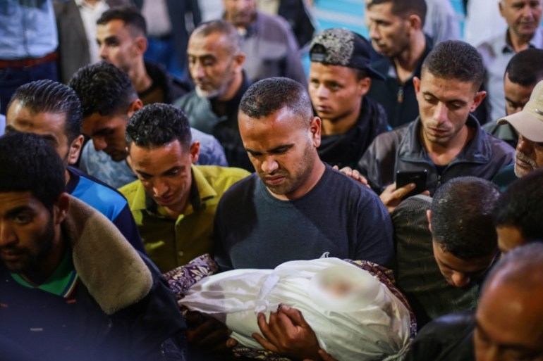 Gaza violence children funeral [Bashar Talib/Al Jazeera]