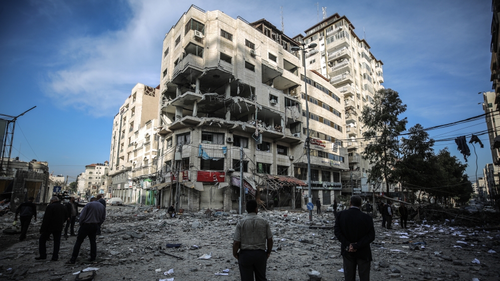 The damaged al-Gussin apartment building after Israeli air raids in Gaza City [Anadolu Agency]