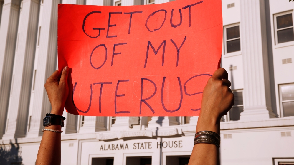 Pro-choice supporters protest in front of the Alabama State House as Alabama state Senate votes on the strictest anti-abortion bill in the United States at the Alabama Legislature in Montgomery
