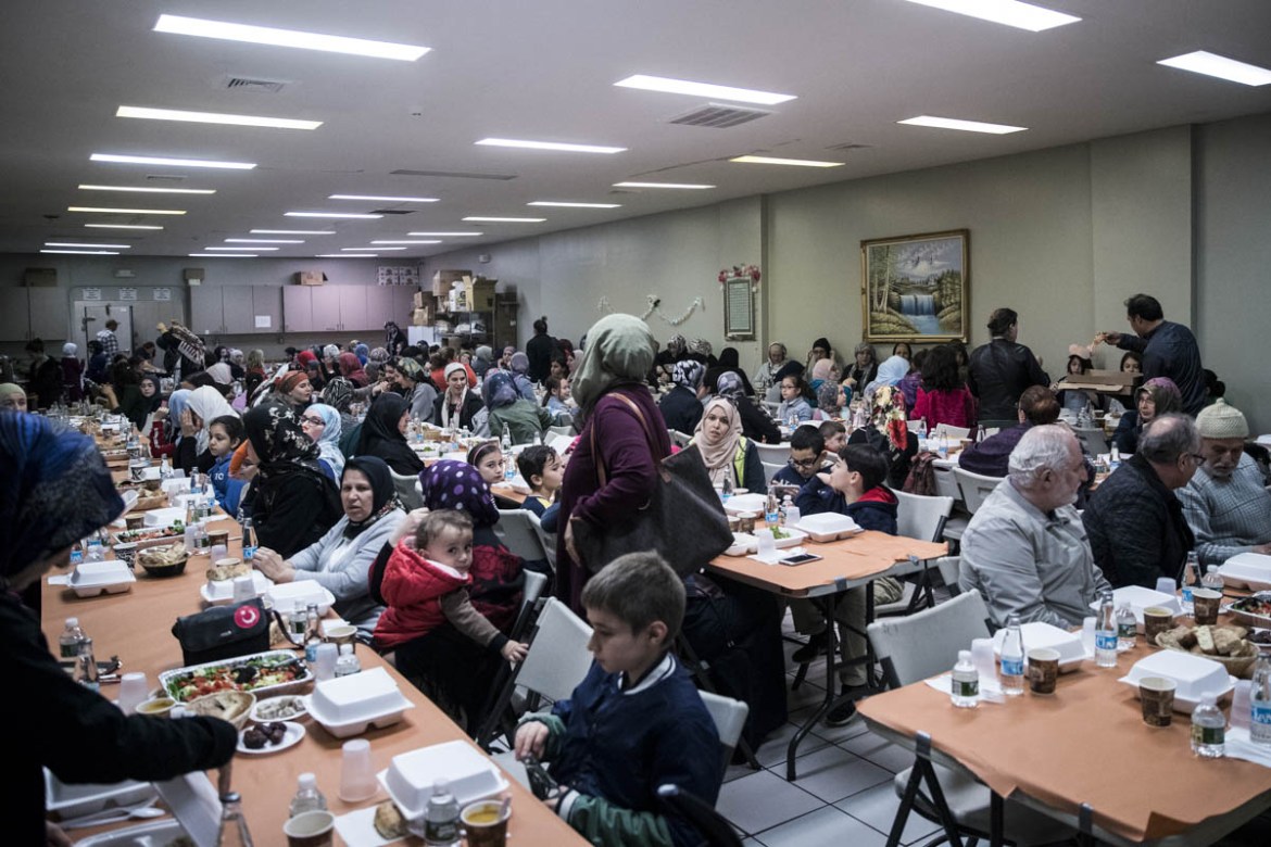 People gather to break their fast on the first day of the holy month of Ramadan at Ulu Mosque in New Jersey, United States on MAY 6, 2019. Anadolu/Atilgan Özdil