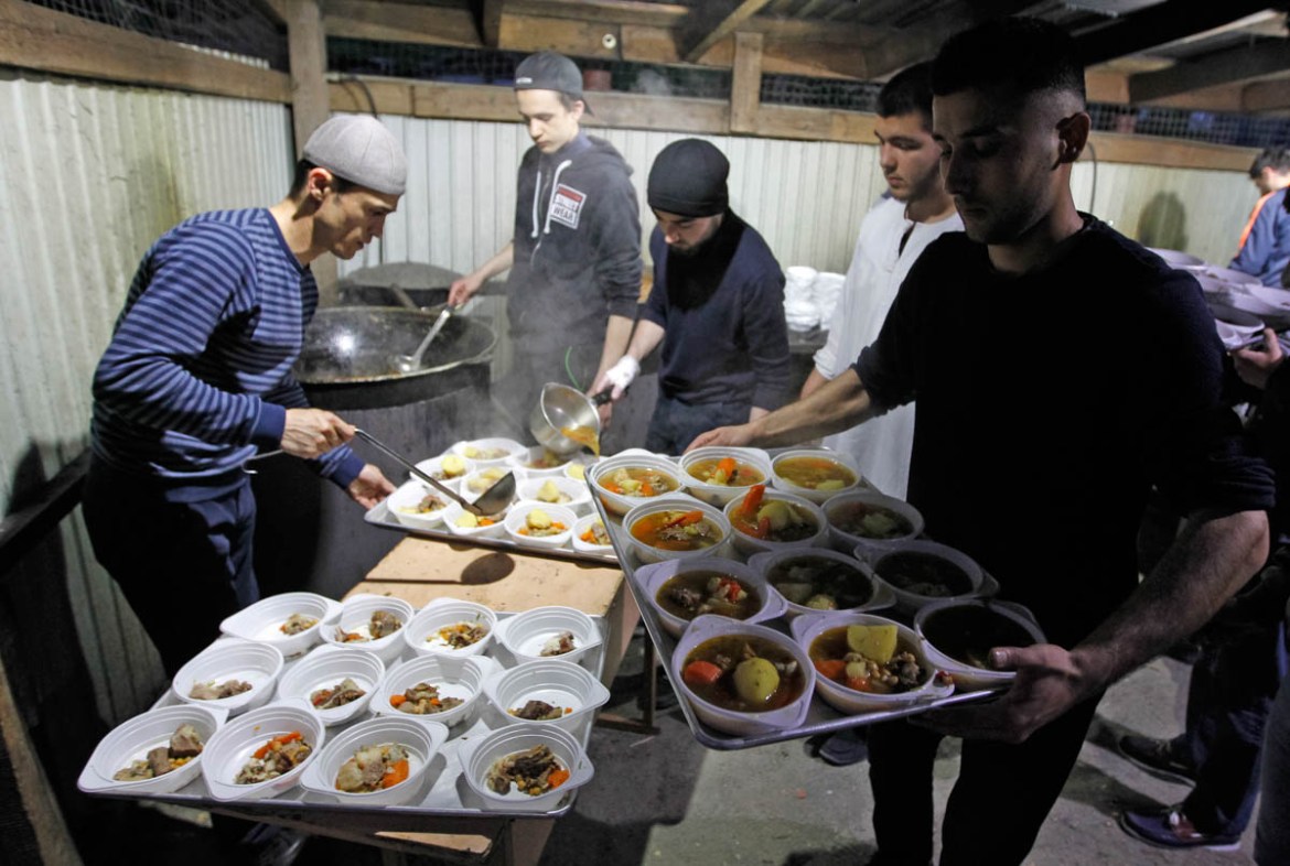 First Iftar Dinner in Kiev- - KIEV, UKRAINE - MAY 06: Muslim people attend an iftar (fast-breaking dinner) on the first day of the holy month of Ramadan at Ar-Rahma Mosque in Kiev, Ukraine on May 06,