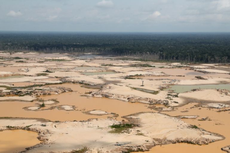 Aerial view shows a deforested area of the Peruvian Amazon rainforest caused by illegal mining, in the Deparment of Madre de Dios, Peru, 05 March 2019