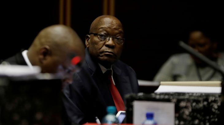 Former South African President Jacob Zuma sits in court, facing charges that include fraud, corruption and racketeering in Pietermaritzburg, South Africa, May 20, 2019