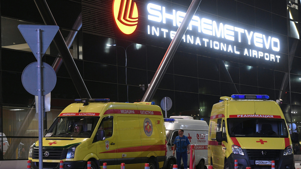 Ambulances are parked in front of Sheremetyevo Airport to take survivors to hospital on Sunday [Kirill Kudryavtsev/AFP]
