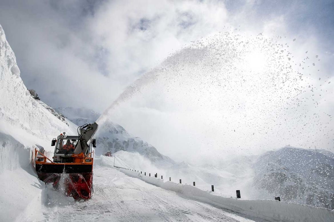 A snowplow works on the Gotthard pass, Switzerland