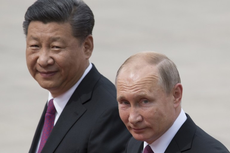 Russian President Vladimir Putin, right, and Chinese President Xi Jinping