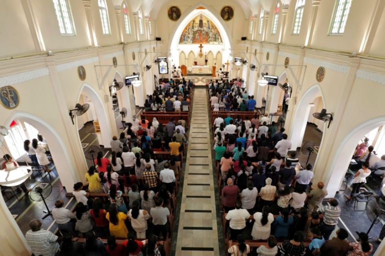 Worshippers pray during a mass at the St.Theresa''s church as the Catholic churches in Sri Lanka restart their Sunday service after Easter Sunday bombing attacks on 21st of April,in Colombo