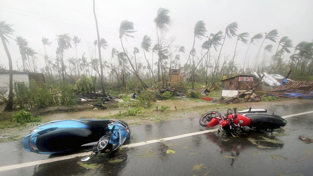 Motorcycles lie on a street in Odisha's Puri city after Cyclone Fani hit on Friday [AP Photo]