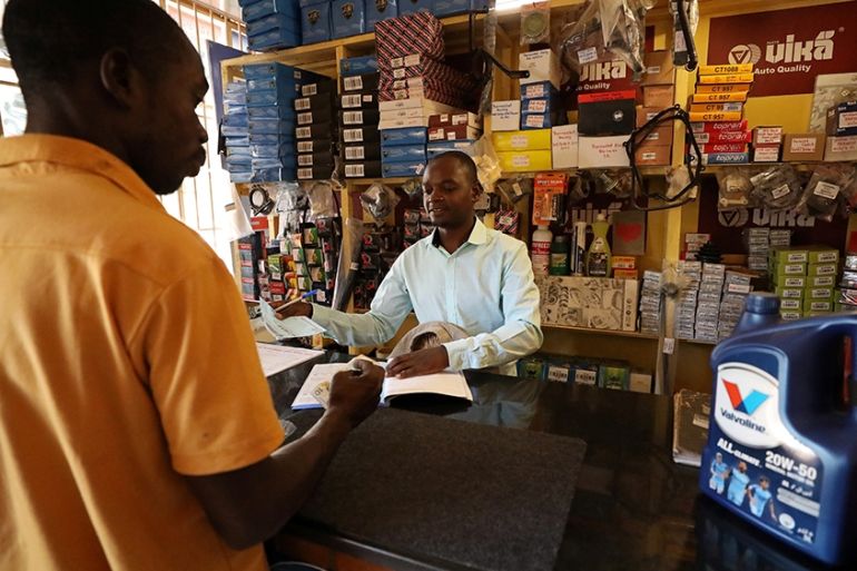 Zimbabwe image of men in shop