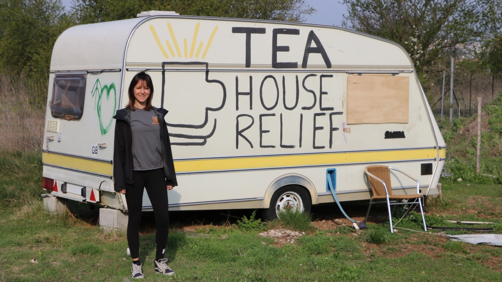 Dina Pasic in front of the mobile canteen from which she served refugees tea and coffee when she first came to Katsikas refugee camp in April 2016 [John Psaropoulos/Al Jazeera]