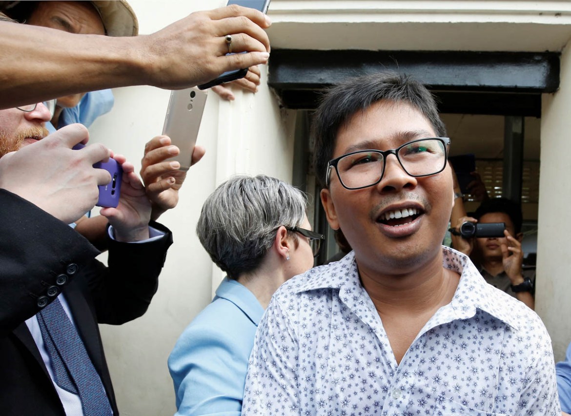 Reuters reporter Wa Lone reacts as he is freed from Insein prison after receiving a presidential pardon in Yangon, Myanmar, May 7, 2019. REUTERS/Ann Wang