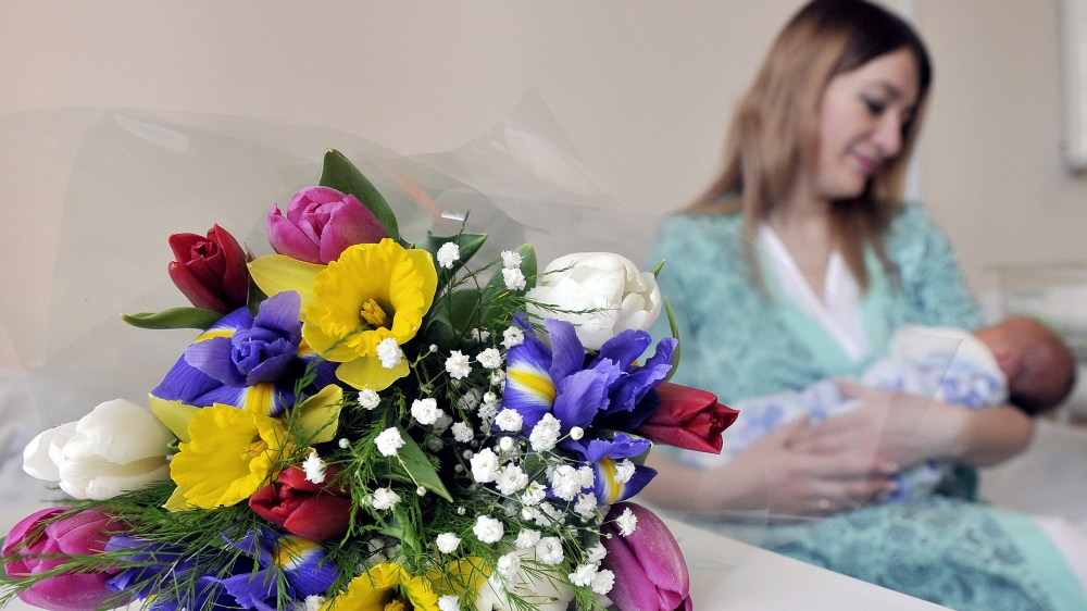 Residents of the UK celebrate 'Mothering Sunday' on the fourth Sunday of Lent [Lev Fedoseyev/Getty Images]
