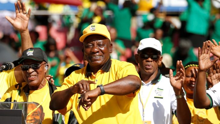 President of South Africa''s governing African National Congress Cyril Ramaphosa gestures during the party''s final rally at Ellis Park Stadium in Johannesburg