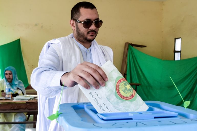 A man cast his vote at a poling station on June 22, 2019 in Nouakchott during the Mauritania''s presidential election. Mauritanians voted today for a new president