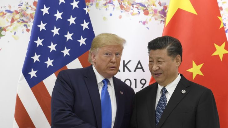 President Donald Trump poses for a photo with Chinese President Xi Jinping