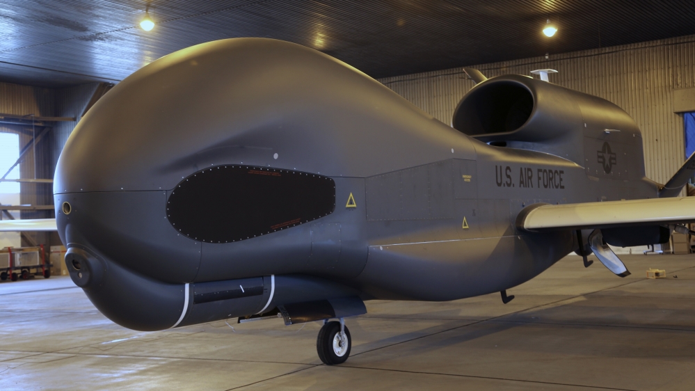 n advanced Global Hawk surveillance drone sits in its hangar at Misawa Air Base in northern Japan Friday, May 30, 2014.