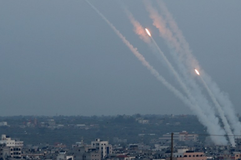Rockets are fired from Gaza towards Israel, in Gaza