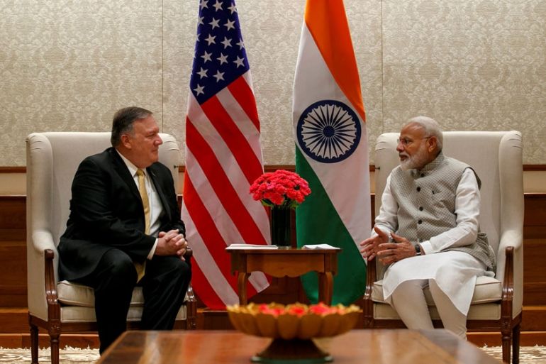 Secretary of State Mike Pompeo, left, talks with Indian Prime Minister Narendra Modi in New Delhi