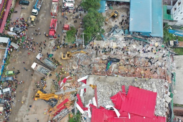 General view of a collapsed under-construction building in Sihanoukville An overhead view of a collapsed under-construction building in