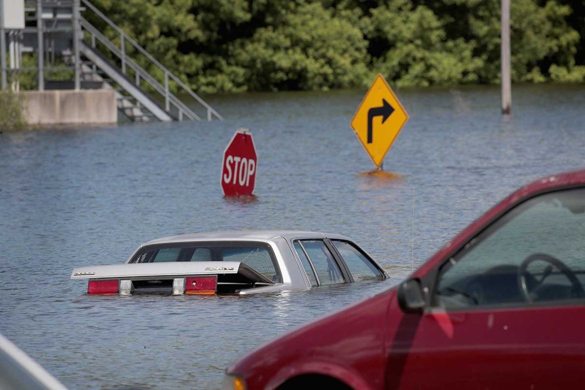 Cars sit in floodwater from the Mississippi River on May 30, 2019 in Saint Mary, Missouri.