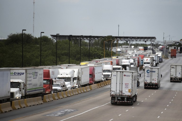 BBG image/trucks on highway for USMCA trade deal