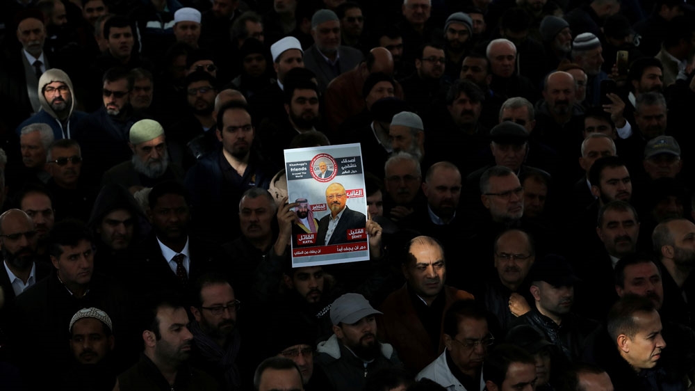 FILE PHOTO: People attend a symbolic funeral prayer for Saudi journalist Jamal Khashoggi at the courtyard of Fatih mosque in Istanbul