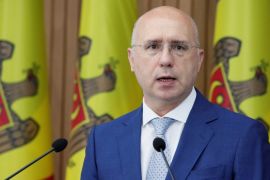 Moldovan interim president Pavel Filip speaks during a news conference in Chisinau