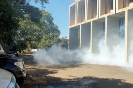 Teargas is seen outside the Malawi Congress Party headquarters in Lilongwe