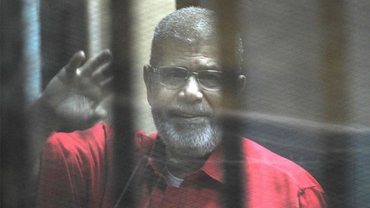 Egypt''s ex-President Morsi dies during trial CAIRO, EGYPT - (ARCHIVE) : A file photo dated August 08, 2015 shows Ousted Egyptian President Mohamed Morsi greeting as he stands inside the defendants''