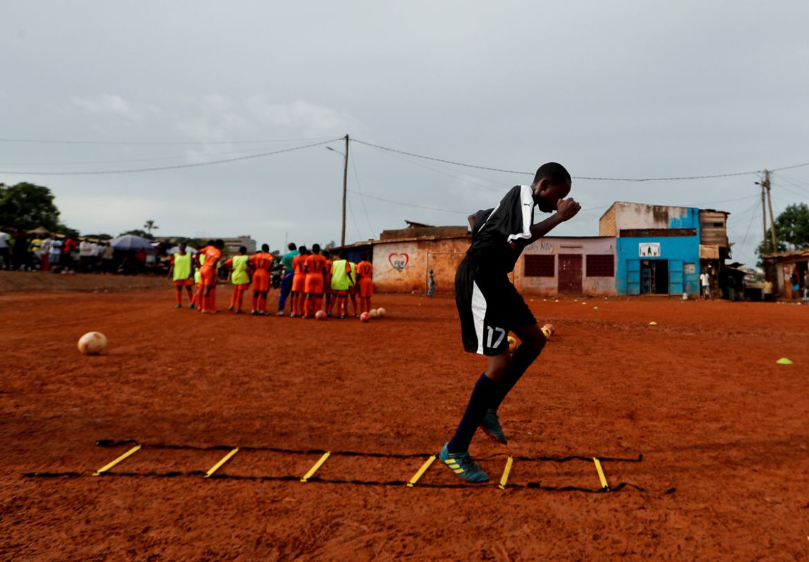 A girl soccer player who is amongst the first wave of girls being trained by professional coaches at the Rails Foot Academy (RFA), attends a training session at the RFA field in Yaounde, Cameroon, May
