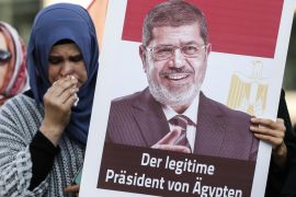 Funeral prayer in absentia for Mohamed Morsi in Germany- - BERLIN, GERMANY - JUNE 18: People attend the funeral prayer in absentia for former President of Egypt Mohamed Morsi, at Pariser Platz, situat