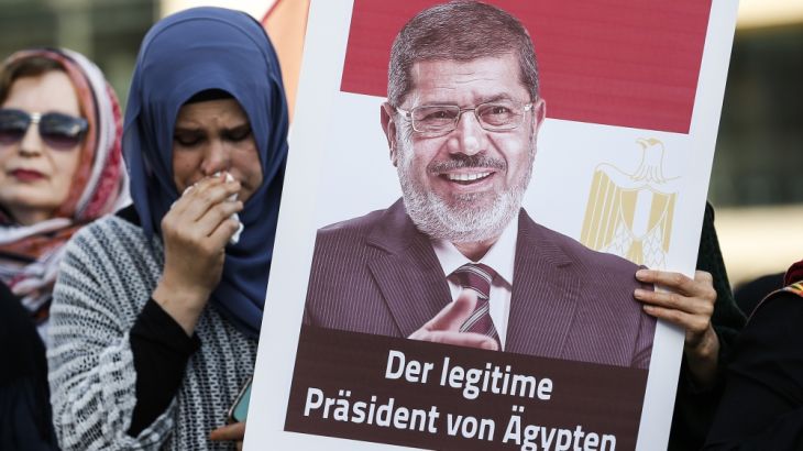 Funeral prayer in absentia for Mohamed Morsi in Germany- - BERLIN, GERMANY - JUNE 18: People attend the funeral prayer in absentia for former President of Egypt Mohamed Morsi, at Pariser Platz, situat