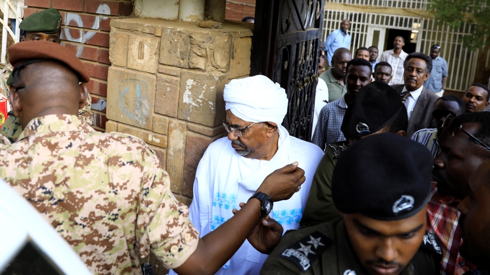Sudan's ex-president Omar al-Bashir leaves the office of the anti-corruption prosecutor in Khartoum