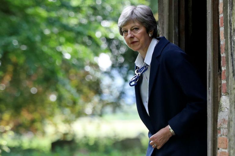 Theresa May leaves church Reuters
