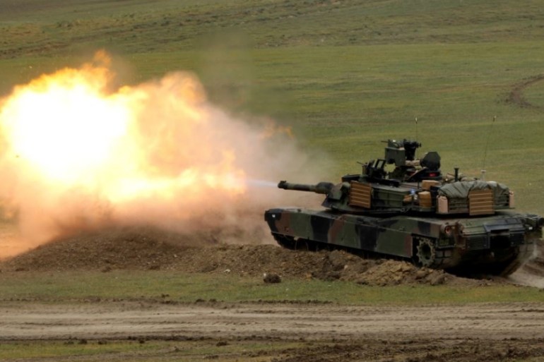 FILE PHOTO: U.S. M1A2 "Abrams" tank fires during U.S. led joint military exercise "Noble Partner 2016" near Vaziani