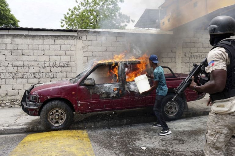 Radio Tele-Ginen vehicle on fire, Haiti