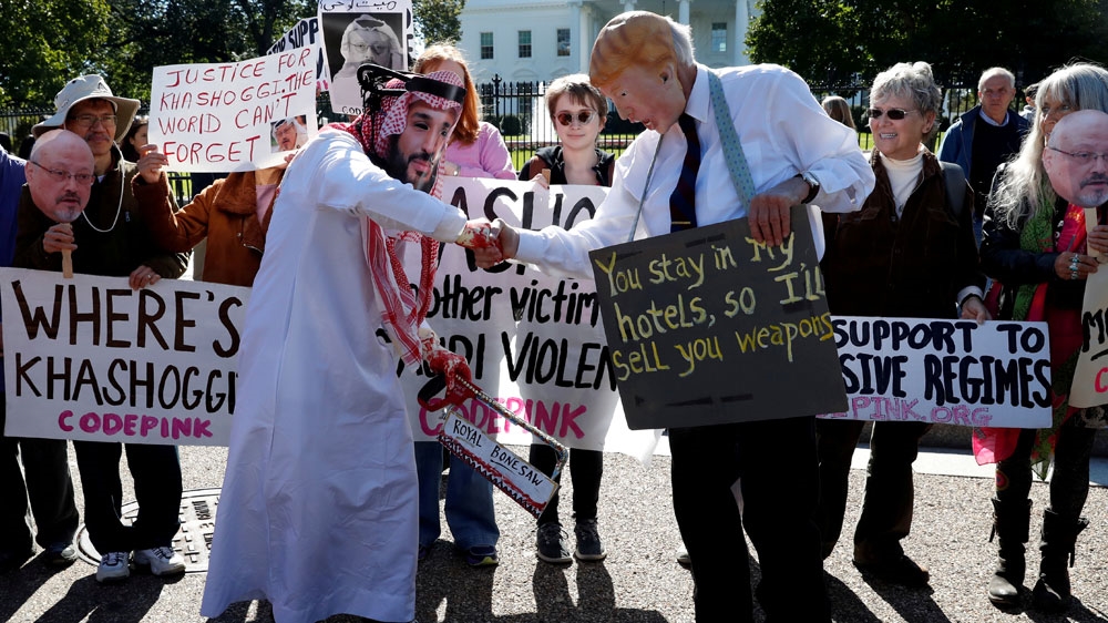 FILE PHOTO: Activists protest the disappearance of Saudi journalist Jamal Khashoggi during demonstration outside the White House in Washington