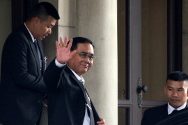 Thailand''s Prime Minister Prayuth Chan-ocha waves as he leaves at the Government House in Bangkok